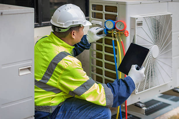 Professional Air Conditioning Repair technician working in Tebbetts, MO